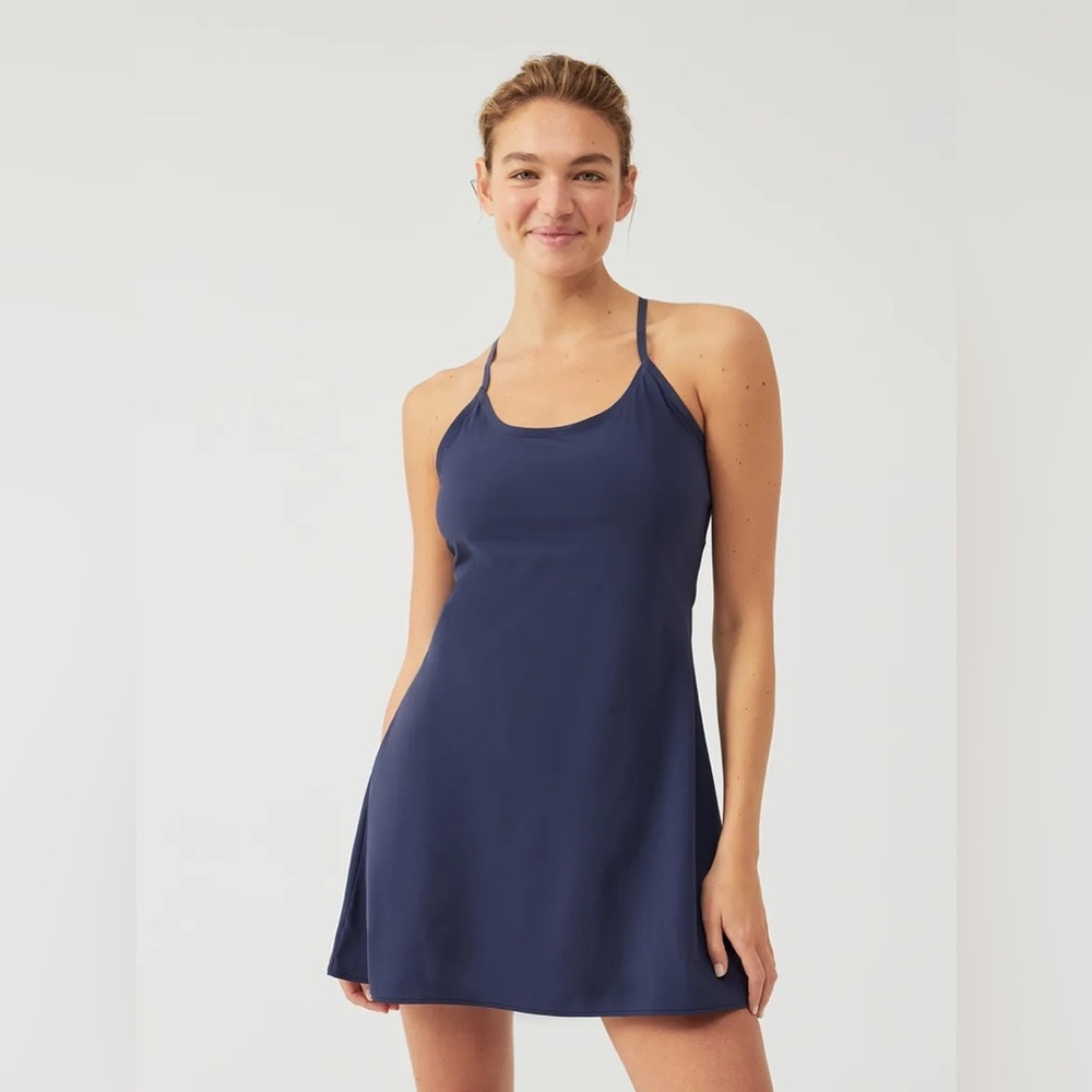 Outdoor Voices Exercise Dress in navy blue and US women’s medium.